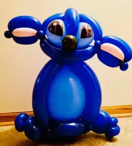 Blue twisted balloon character with big ears